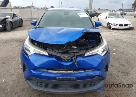 2019 Toyota C-Hr Le z USA, uszkodzony, nr VIN JTNKHMBX1K1026120